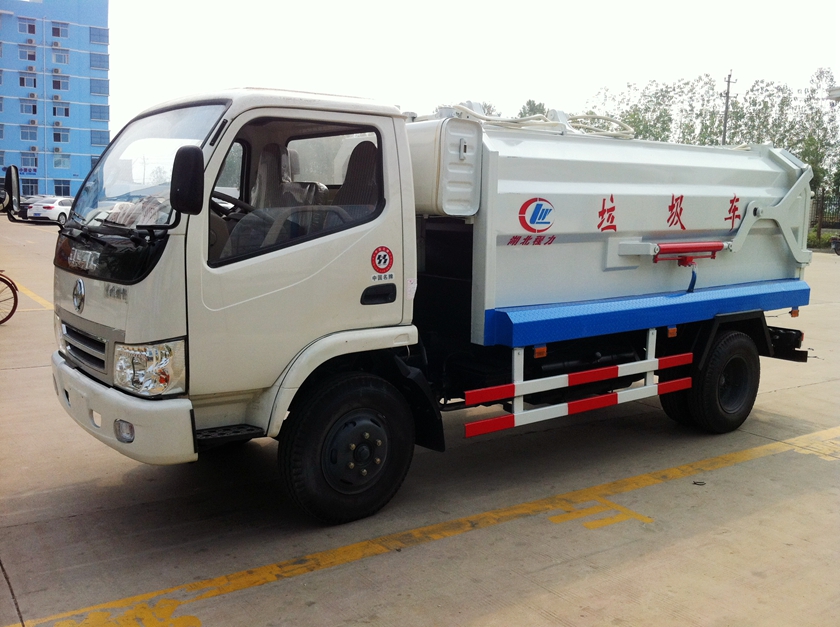 東風福瑞卡側(cè)裝掛桶式垃圾壓縮車圖片,東風福瑞卡側(cè)裝壓縮車圖片,東風福瑞卡側(cè)裝壓縮垃圾車圖片