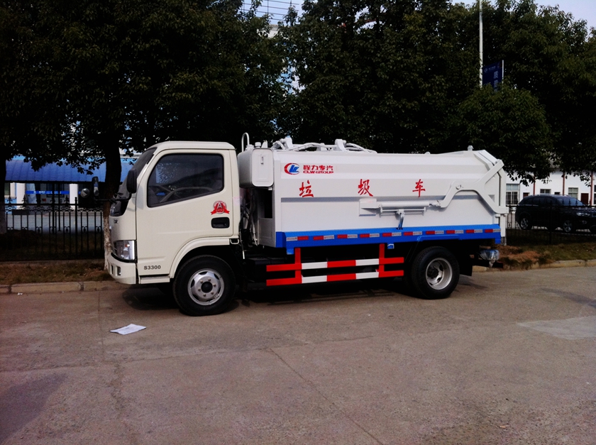 東風福瑞卡側(cè)裝掛桶式垃圾壓縮車圖片,東風福瑞卡側(cè)裝壓縮車圖片,東風福瑞卡側(cè)裝壓縮垃圾車圖片