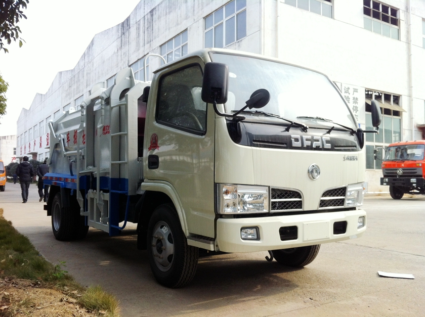 東風福瑞卡側(cè)裝掛桶式垃圾壓縮車圖片,東風福瑞卡側(cè)裝壓縮車圖片,東風福瑞卡側(cè)裝壓縮垃圾車圖片
